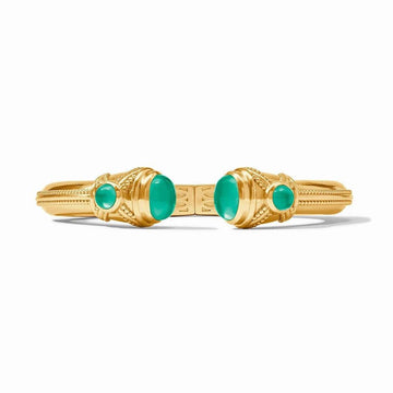 Gold Cabochon Demi Cuff bracelet with green gemstones.
