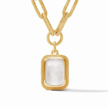 Gold statement necklace featuring a rectangular opal pendant with a textured gold frame.
