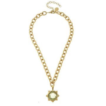 Gold chain necklace featuring a Venetian glass fleur-de-lis pendant.
