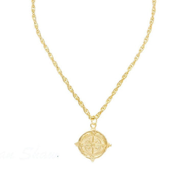 Gold Compass Rope Chain Pendant Necklace with intricate detailing.
