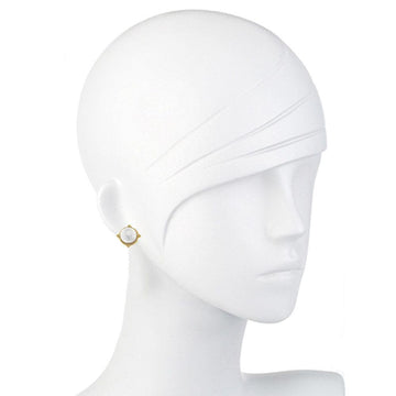 White pearl stud earrings with gold setting, shown on a mannequin.

