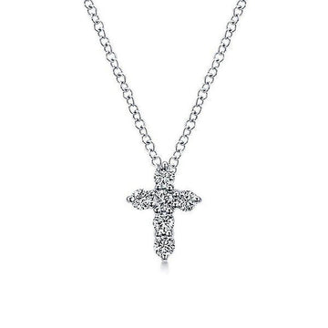 Diamond Cross Necklace: Elegant silver chain, delicate cross pendant adorned with sparkling diamonds.
