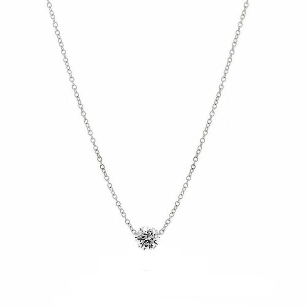 Elegant solitaire diamond pendant necklace with delicate chain.
