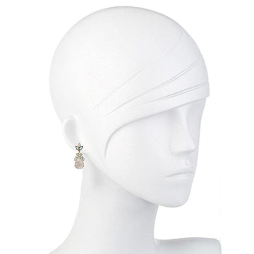 Elegant moonstone and blue quartz drop earrings on a mannequin.
