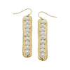 Freshwater Pearl & Handcast Gold Bar Earrings: Elegant, gold-toned bar earrings featuring a row of lustrous white pearls.

