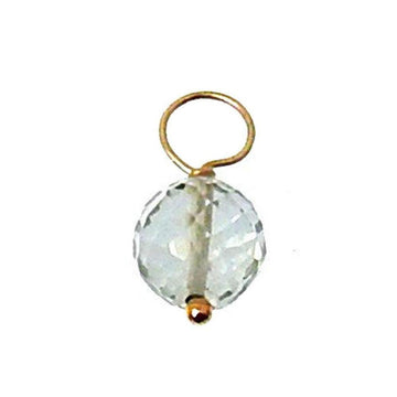 Clear quartz gemstone pendant with gold accent
