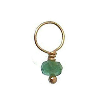 Gold hoop charm with a faceted green gemstone accent.

