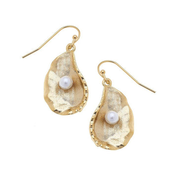 Gold oyster shell dangle earrings with pearl accents

