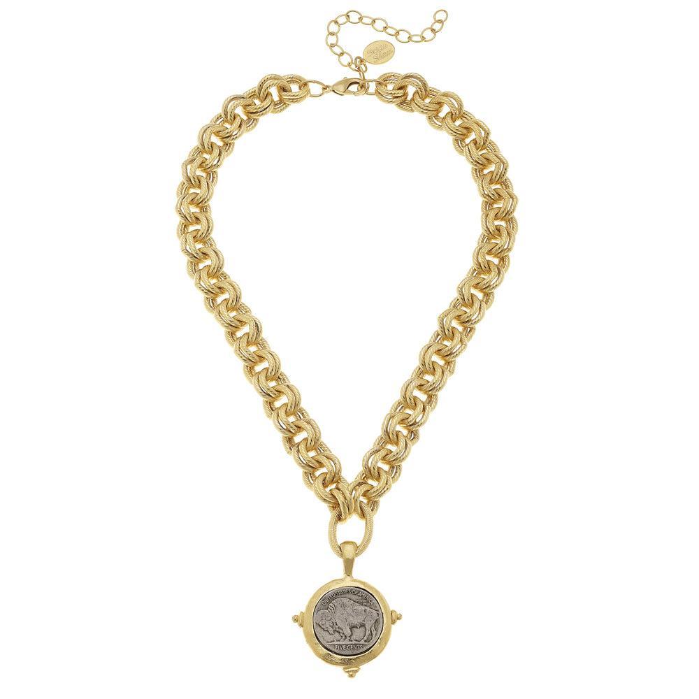 Gold chain necklace featuring a spinning buffalo nickel pendant.

