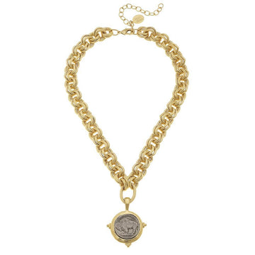 Gold chain necklace featuring a spinning buffalo nickel pendant.
