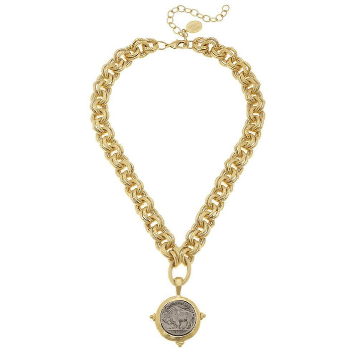 Gold chain necklace featuring a spinning buffalo nickel pendant.
