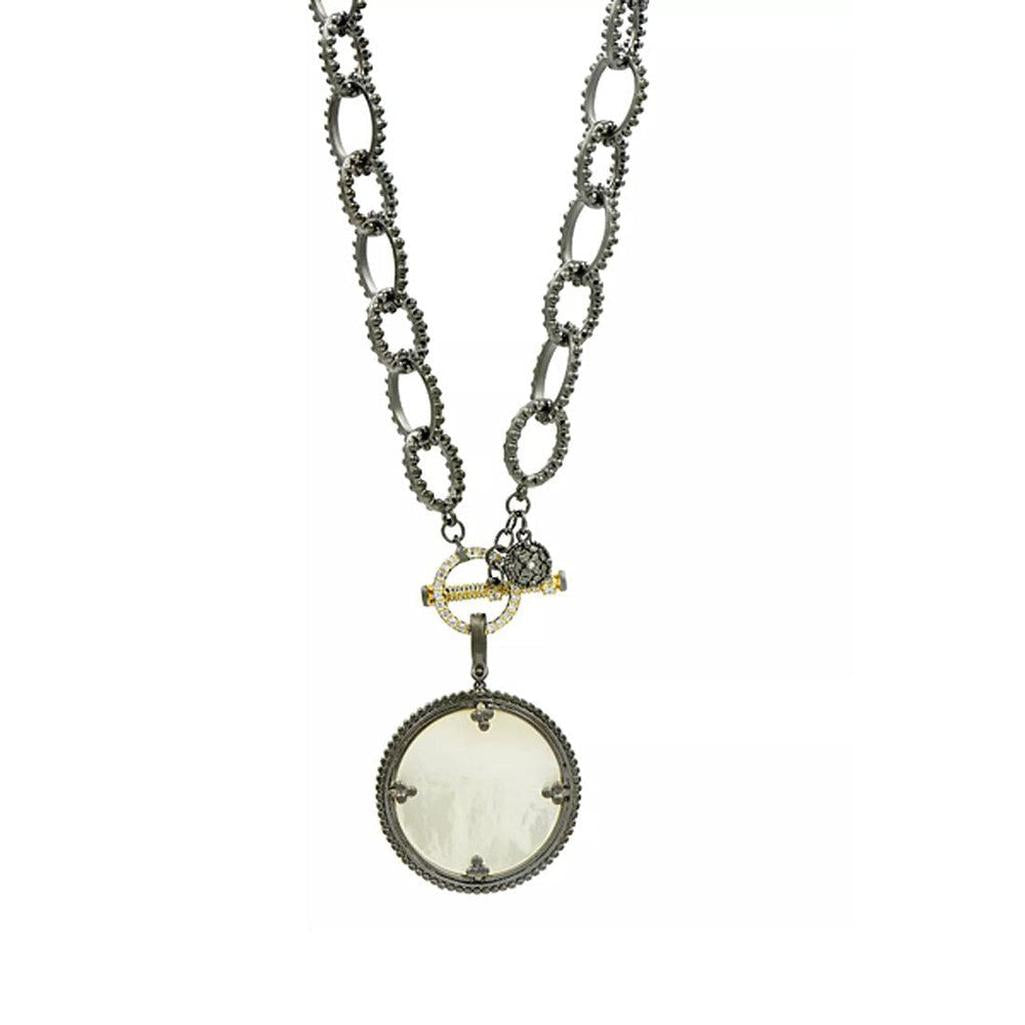 Imperial Mother of Pearl pendant necklace with black rhodium chain and diamond accents.

