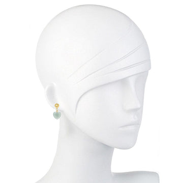 Jade heart earrings on a mannequin, showcasing delicate design.
