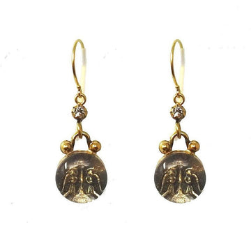 Gold drop earrings featuring guardian angel charms and tiny diamond accents.
