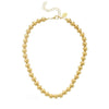 Mini Margaret gold bead necklace; elegant, gold-tone, matte finish.
