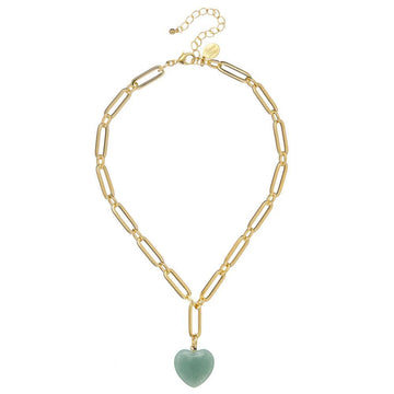 Gold chain necklace with light green heart pendant
